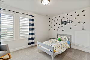 Bedroom with carpet flooring