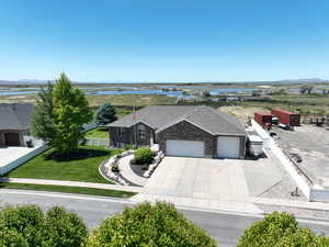 View of subject property featuring a water and mountain view