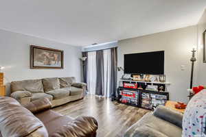 Living area with wood finished floors