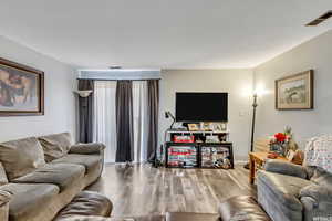Living room with wood finished floors
