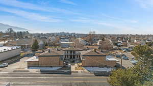 City view with nearby suburban area and mountains