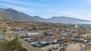 Aerial view of residential area with a mountainous background