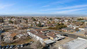 Aerial overview of property's location with nearby suburban area