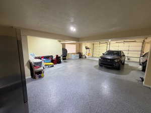 Parking garage with freestanding refrigerator