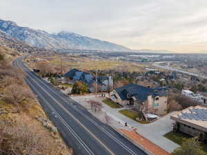 Aerial view of residential area featuring mountains