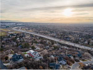 Aerial overview of property's location featuring nearby suburban area