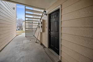 Entrance to property with a patio