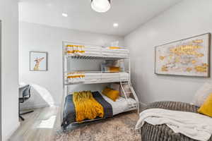 Bedroom featuring light wood finished floors and recessed lighting