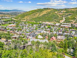 Aerial perspective of suburban area featuring mountains