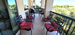 Balcony featuring a grill