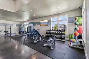 Exercise room featuring recessed lighting
