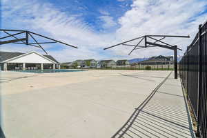 View of home's community featuring a residential view, a patio, and a pool