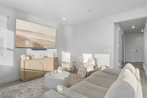 Bedroom featuring wood finished floors and recessed lighting