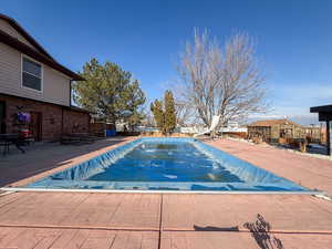outdoor pool and Detached studio guest house 896 sq ft.  currently rented $1800/month  can help off set the mortgage.