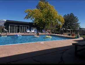 .92 Acre. Detached studio guest house 896 sq ft. $1800/month immediate income to help off set the mortgage 40x60 heated workshop with a 18' door. Outdoor pool. View of property location featuring property boundaries highlighted and a pool