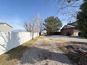 .92 Acre. Detached studio guest house 896 sq ft. $1800/month immediate income to help off set the mortgage 40x60 heated workshop with a 18' door. Outdoor pool. View of property location featuring property boundaries highlighted and a pool.