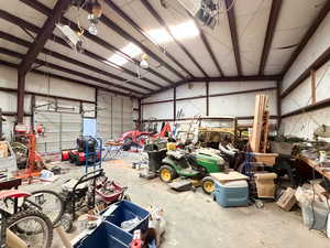 ..92 Acre. Detached studio guest house 896 sq ft. $1800/month immediate income to help off set the mortgage 40x60 heated workshop with a 18' door. Outdoor pool. View of property location featuring property boundaries highlighted and a pool