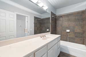Full bath with vanity and bathing tub / shower combination