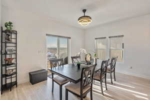 Dining room with entrance to backyard.