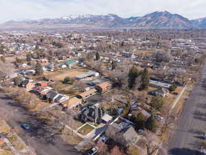 View of property location with a mountain backdrop and nearby suburban area