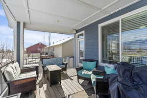 Deck featuring outdoor lounge area