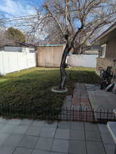 View of fenced backyard