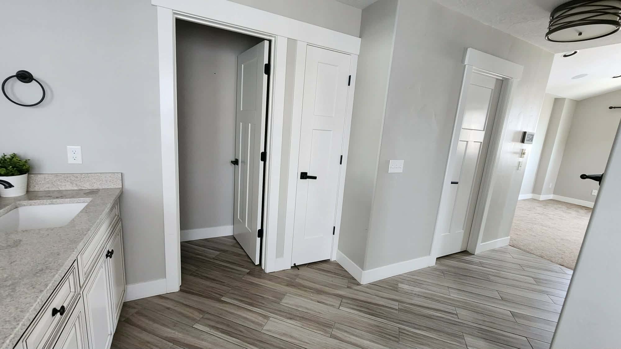 Bathroom with vanity and light wood-style flooring