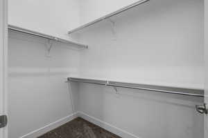 Walk in closet in the loft
