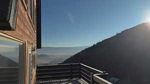 Balcony featuring a deck with mountain view