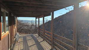 Wooden deck featuring a mountain view