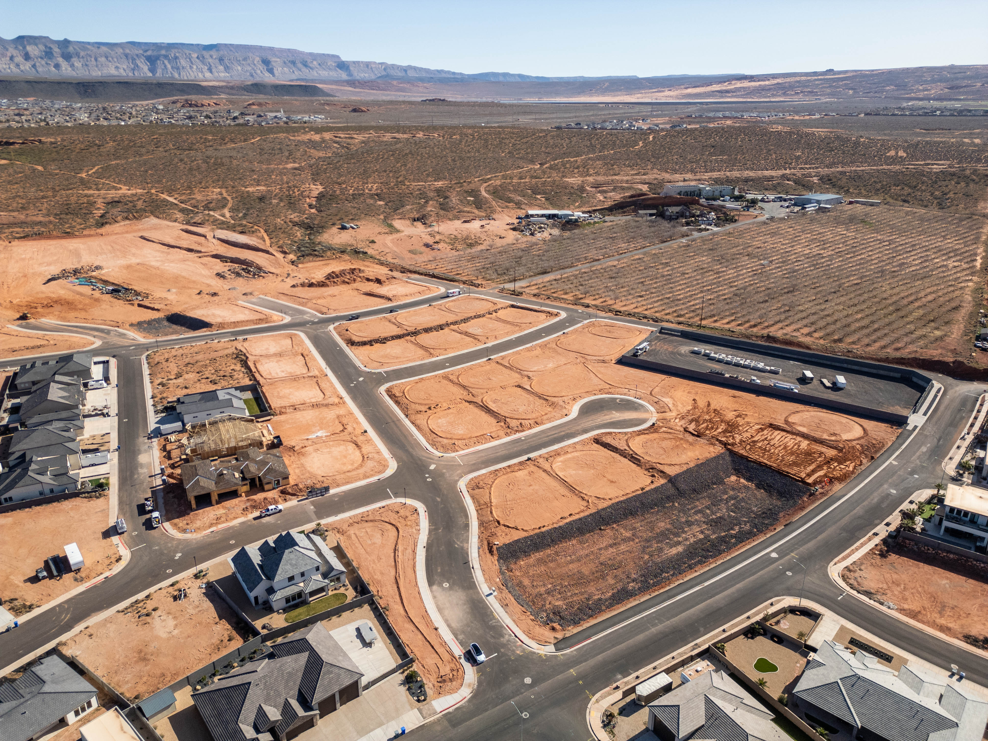Aerial overview of property's location featuring rural landscape and a mountain backdrop