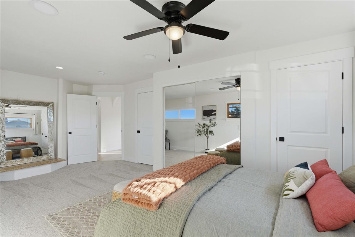 Bedroom featuring carpet flooring, a ceiling fan, a closet, and recessed lighting