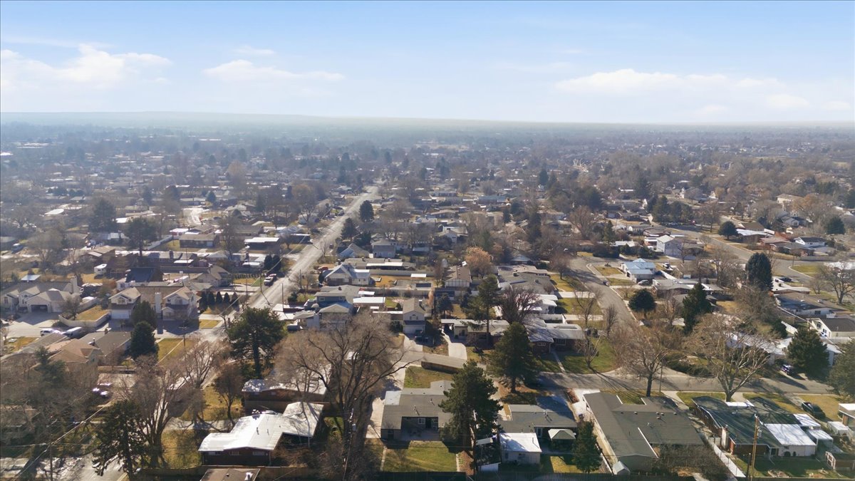 View of property location featuring nearby suburban area