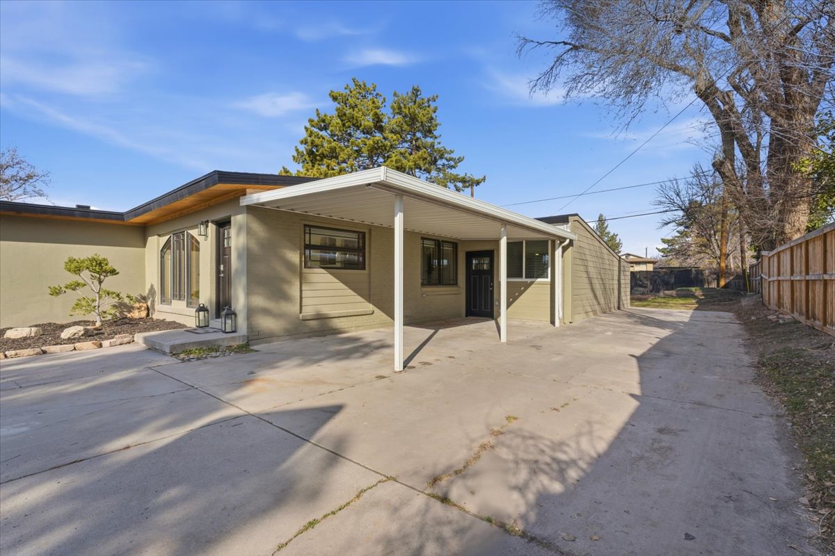 Back of house with a patio area