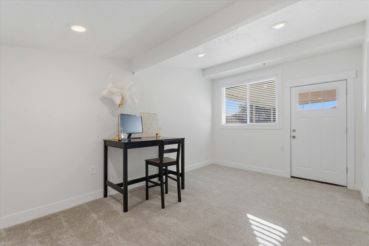 Home office with light carpet, recessed lighting, and beam ceiling
