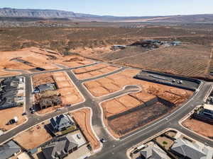 Aerial view of property and surrounding area with rural landscape and mountains