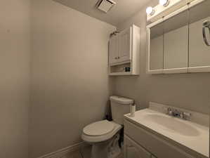 Bathroom with vanity and light tile patterned floors