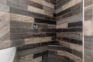 Bathroom with a tile shower