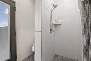 Bathroom with a stall shower
