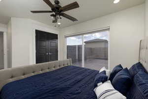 Bedroom featuring access to exterior, a closet, recessed lighting, and a ceiling fan