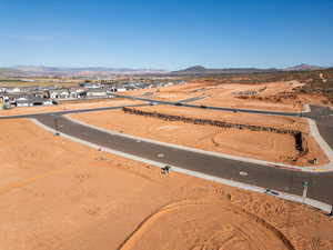Aerial view of residential area featuring a mountain backdrop