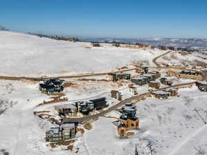 Snowy aerial view with a residential view