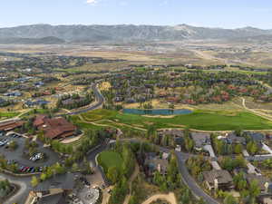 View of property location with nearby amenities including golf course and mountain view