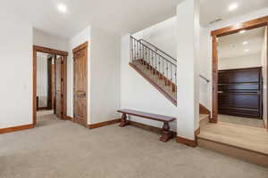 Stairway from the main level to the lower level family room