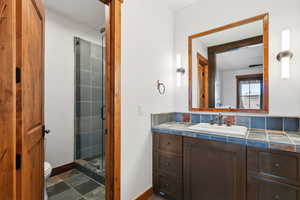 4th bedroom bathroom with vanity and shower