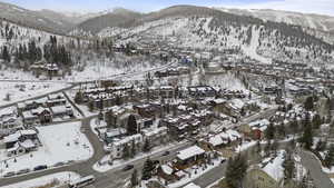 Snowy aerial view with a mountain view