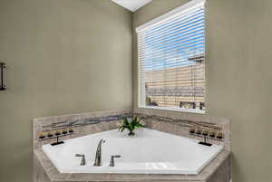 Bathroom featuring a bath