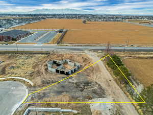 Aerial overview of property's location featuring mountains and property boundaries highlighted