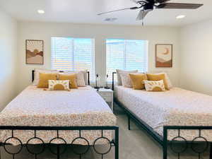 Bedroom with recessed lighting and a ceiling fan