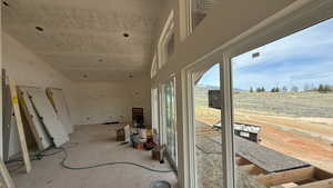 Miscellaneous room featuring a high ceiling